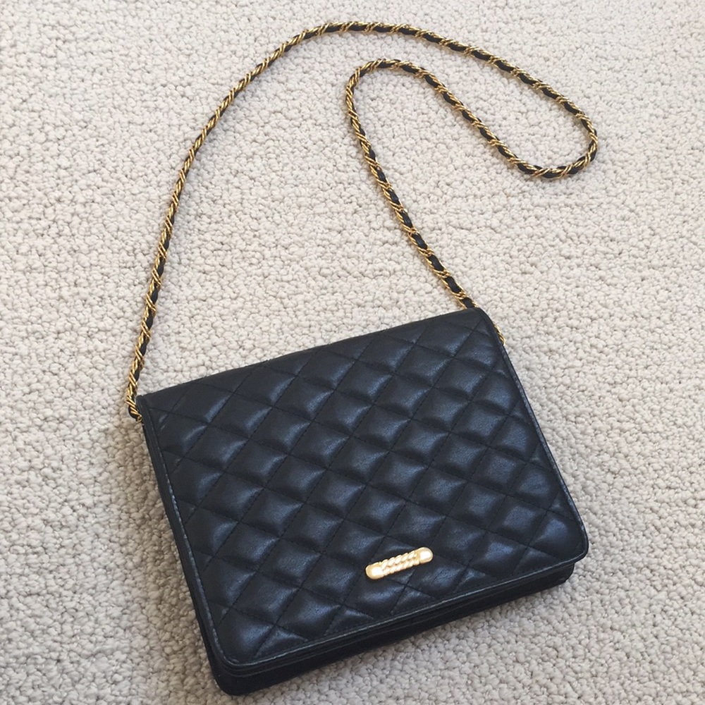Vintage soft Leather quilted bag. Black gold chain